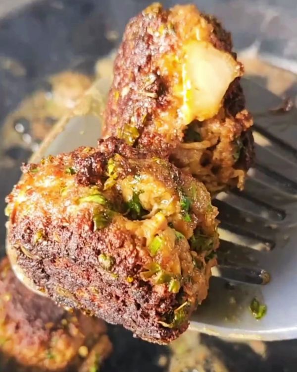 Step 1.1: Heat olive oil in a pan and shallow fry the meatballs until browned on all sides