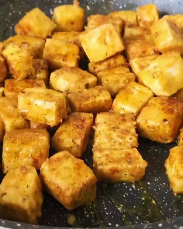 Step 1.1: Heat the vegetable oil in a skillet over medium heat, and pan-fry the tofu until golden and crispy on all sides