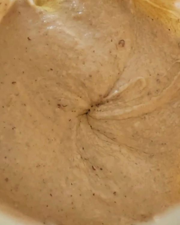 Step 2.1: In a bowl or food processor, combine the eggplant pulp, tahini, lemon juice, minced garlic, cumin, salt, and pepper