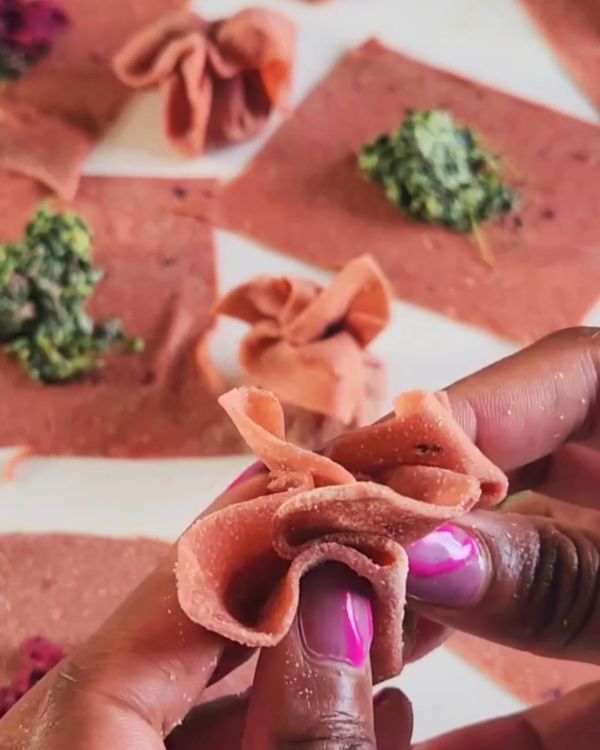 Step 3.2: Spoon filling into the center of each square with spinach and beet (leftover) and fold into parcels
