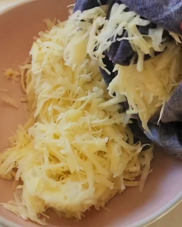 Step 1.1: Grate the potatoes using both the large and medium sides of a box grater