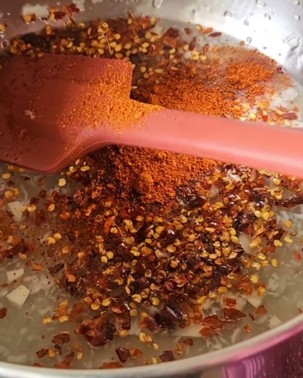 Step 2.1: Let the mixture simmer gently for about 5-8 minutes, allowing the flavors to meld and the sauce to thicken slightly