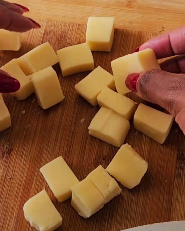 Step 2.1: Take a small portion of the potato mixture and flatten it in your hand