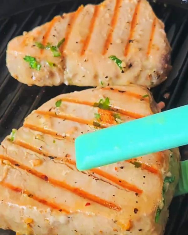 Step 2.1: Grill the marinated tuna steaks for 3 minutes on each side