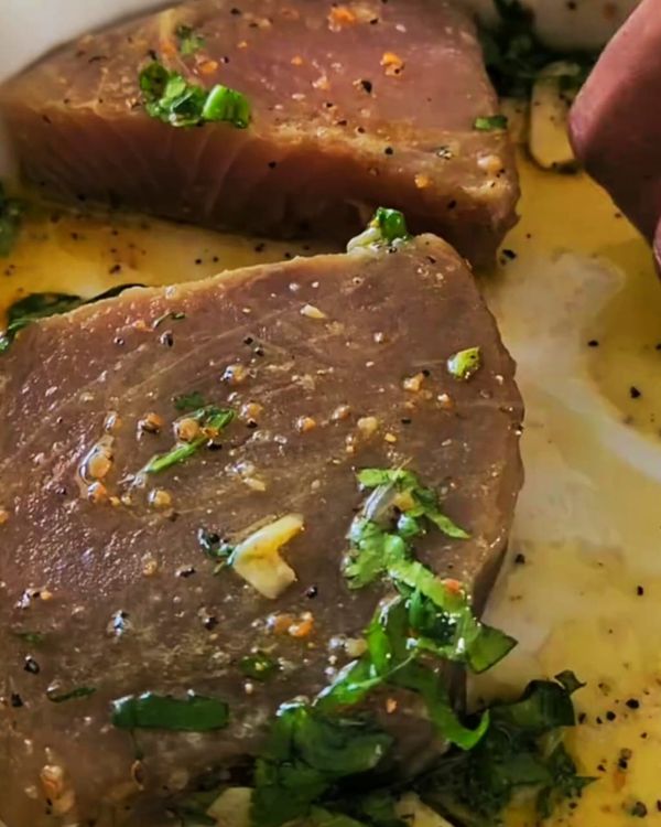 Step 1.1: Place the tuna steaks in the marinade and let them sit for 15 minutes