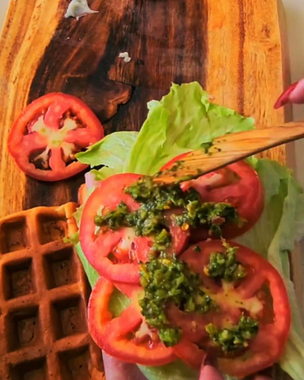 Step 3.1: For a sandwich, layer with cheese, ham, lettuce, tomato, and pesto before serving