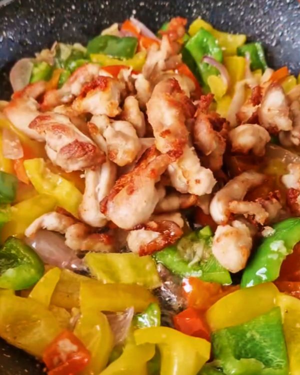 Step 2.1: Return the cooked chicken to the pan with the vegetables