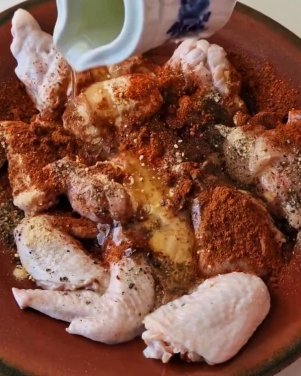 Step 1.1: In a bowl, mix garlic powder, cayenne pepper, paprika, salt, pepper, lemon juice, and vegetable oil