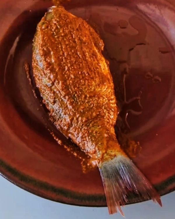 Step 1.1: Rub the mixture generously over the fish, ensuring it coats the cuts