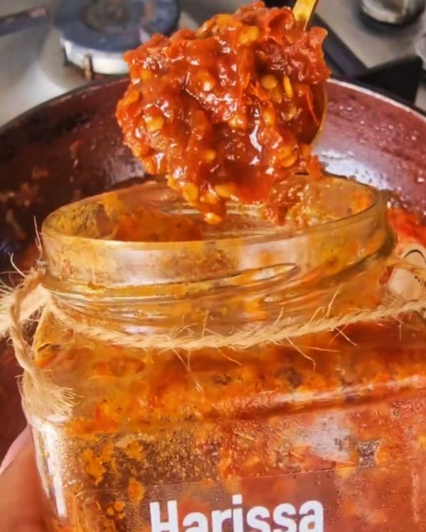 Step 2.1: Stir in harissa paste, smoked paprika, cumin, and chili flakes