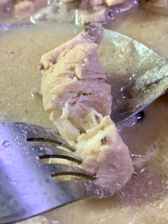 Step 1.1: To check if the chicken is tender, it should come apart quickly from the bone when poked with a fork