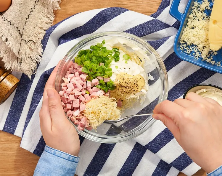 Step 1.1: In a medium mixing bowl, combine the cooked ham, Swiss cheese, cream cheese, scallion, Dijon mustard, and pepper