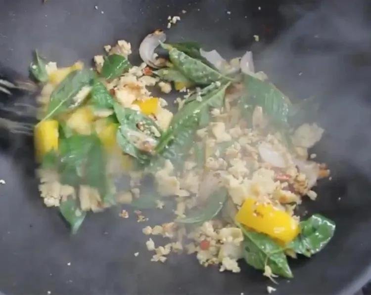 Step 2.1: Add the bell pepper and fresh basil to the wok