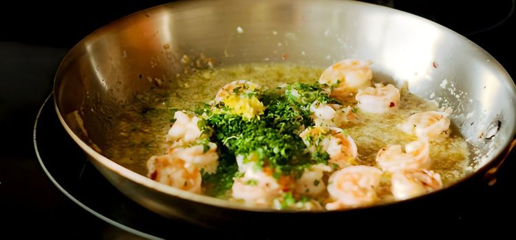 Step 1.1: Remove the frying pan from the heat and add the lemon zest and juice, and parsley