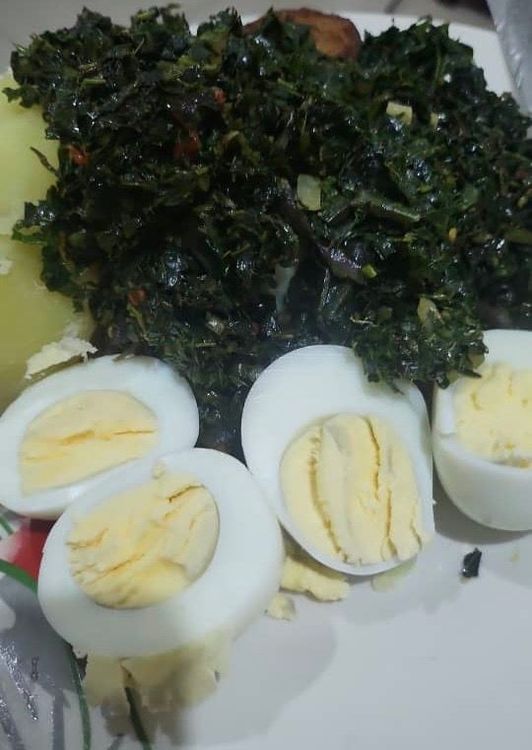 Step 1.1: Serve the stir-fried pumpkin leaves with the boiled sweet potatoes (with or without the skin, as desired) and the hard-boiled eggs