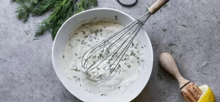 Step 4.1: While the potatoes and asparagus cool, whisk plain yogurt dressing and roasted garlic yogurt dressing with lemon juice and fresh dill