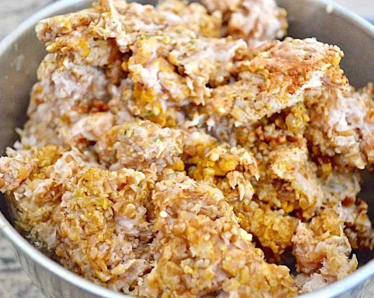 Step 3.1: Add dried onions, garlic powder, ground cumin, ground cinnamon, ground turmeric, and paprika to the ground chicken
