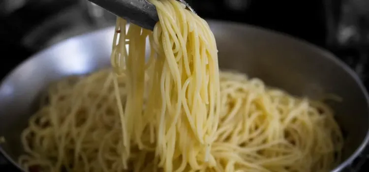 Step 2.1: Add the drained pasta to the pan with the pancetta