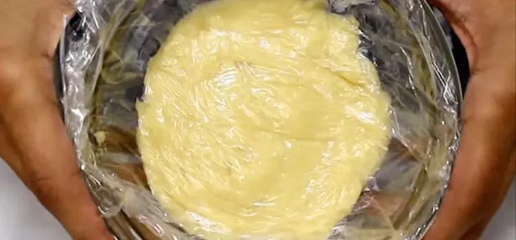 Step 2.1: Cover the custard with plastic wrap, ensuring it touches the top to prevent a skin from forming