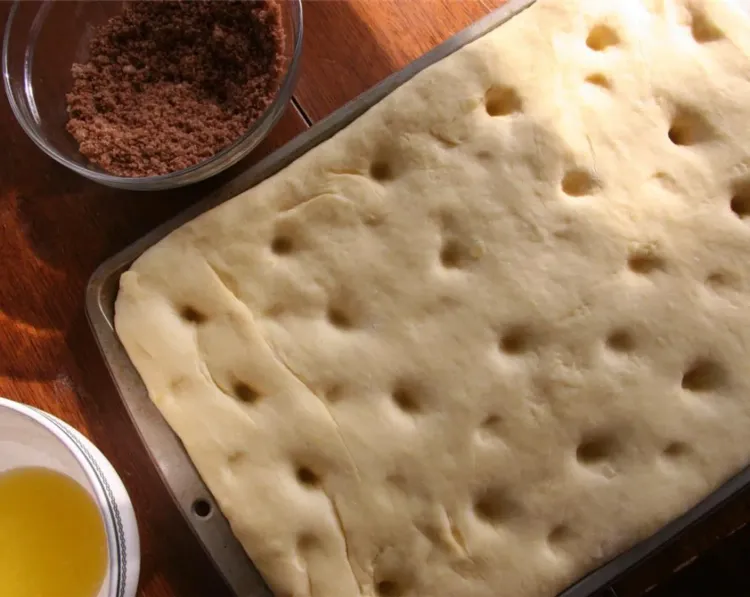 Step 1.1: Dimple the dough by making deep indentations with your fingertips at 1 1/2-inch intervals