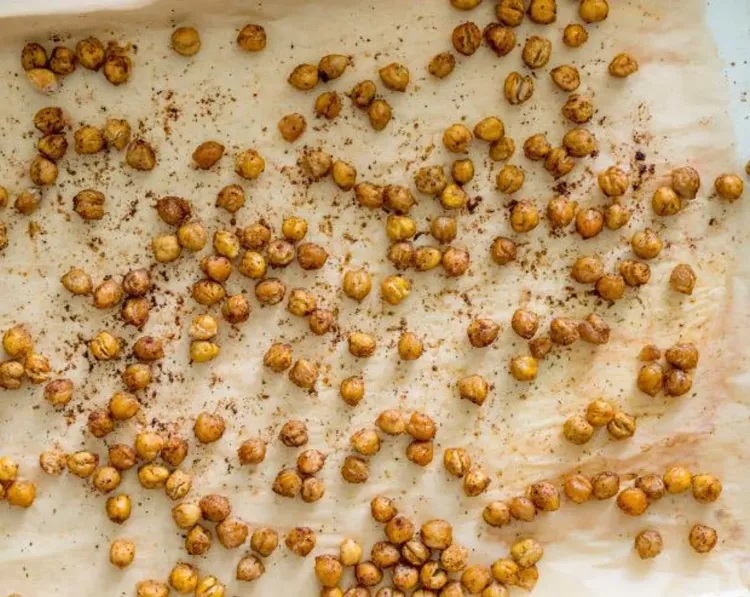 Step 1.1: Evenly spread chickpeas across the parchment-covered baking sheet