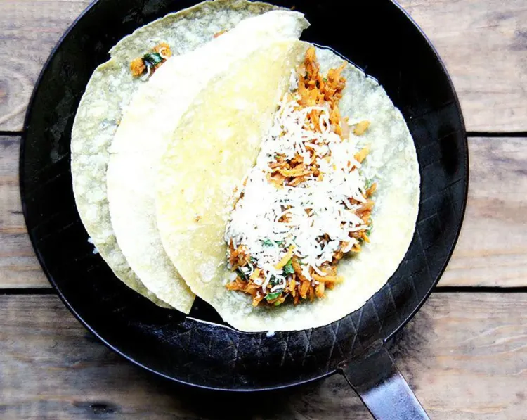 Step 1.1: Spread 1/8th of the filling over each tortilla