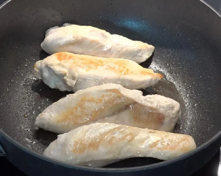 Step 1.1: Pour olive oil into a large deep fry pan over medium heat
