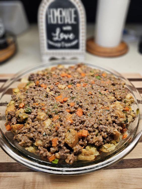 Step 1.1: Spoon the mixture into the pie shell, garnish with sourdough breadcrumbs (optional) and bake at 350°F for 25 to 30 minutes, or until heated through