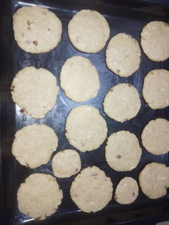 Step 2.1: Flatten each ball and place them on a baking tray