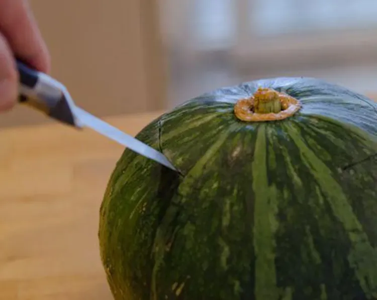 Step 2.1: Cut out the top of the pumpkin and keep it