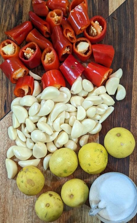 Step 1.1: Chop the chillies, shell the garlic and squeeze out the lemon juice