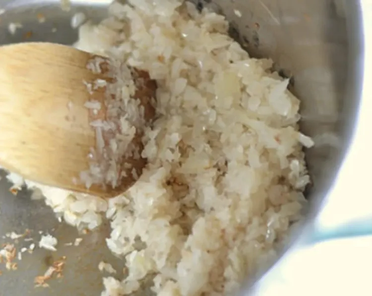 Step 2.1: In another pot, sauté the onion until translucent
