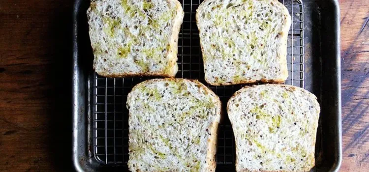 Step 3.1: Arrange bread slices on a cooling rack set on a sheet pan