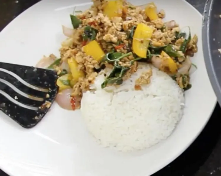 Step 2.1: Transfer the stir fry to a plate with cooked white rice