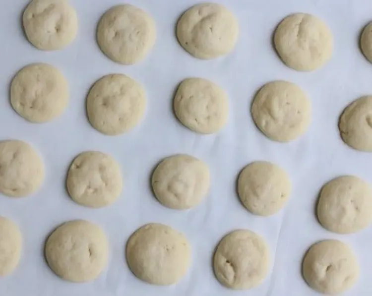 Step 2.1: Bake one pan at a time in the preheated oven until cookies are slightly puffy and edges have begun to set and the bottoms are lightly golden brown, about 11-13 minutes