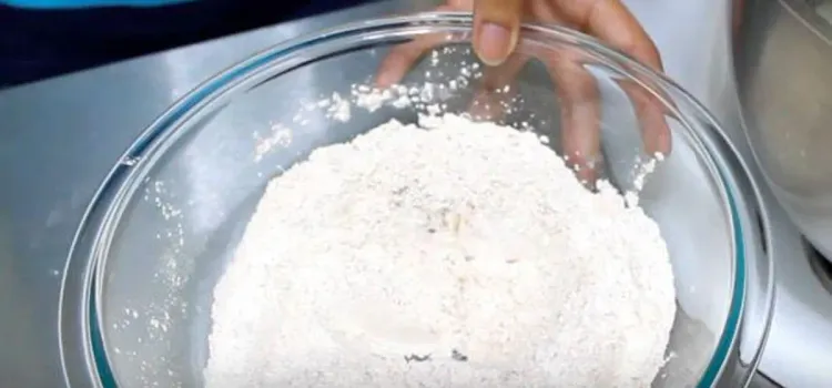 Step 1.1: In a mixing bowl, add all-purpose flour, ground cinnamon, ground nutmeg, salt, baking soda, and baking powder