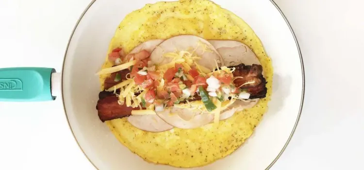 Step 1.1: Layer the deli turkey, followed by center cut bacon, shredded cheese, and pico de gallo