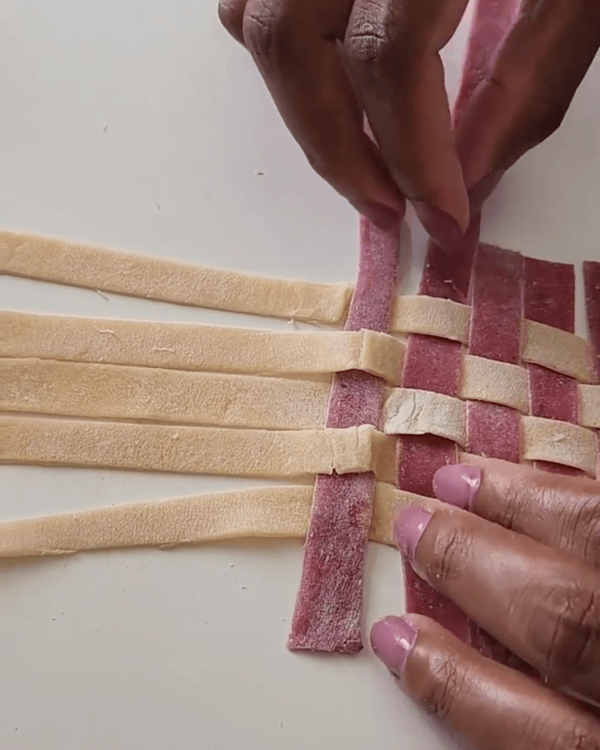 Step 5.1: Take another rolled piece of dough and cut it into thin strips to create a lattice pattern