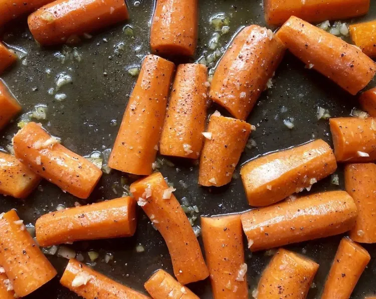 Step 2.1: Transfer the carrots to the prepared baking sheet and arrange them in a single layer