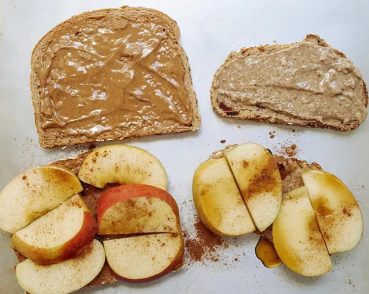 Step 2.1: Layer one slice with apples, sprinkle with ground cinnamon, and add a light drizzle of maple syrup over the top