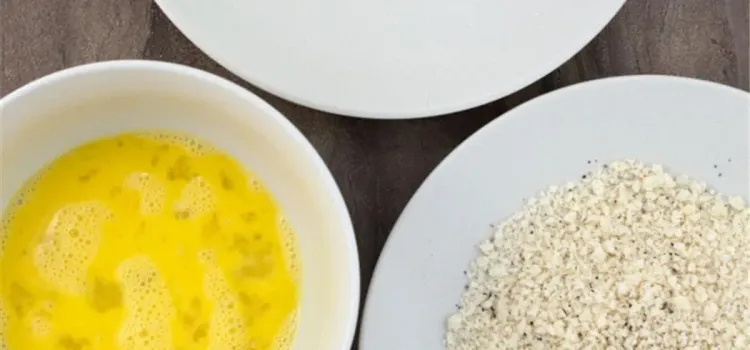 Step 1.1: Line up a plate with all-purpose flour, a bowl with the beaten egg, and a plate with the panko breadcrumbs