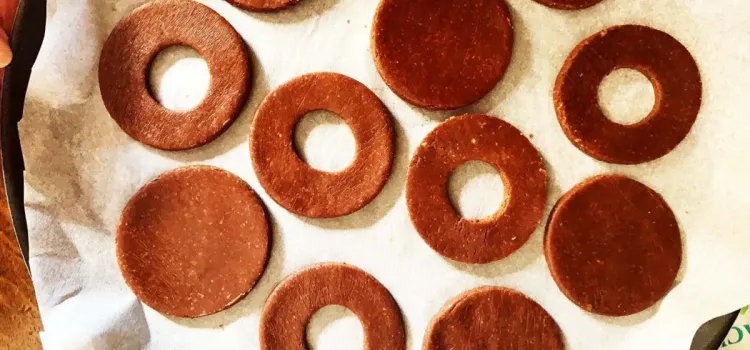 Step 3.1: Cut out 12 pieces of dough with a cookie cutter, then use a smaller cutter to cut holes in the center of half of the circles