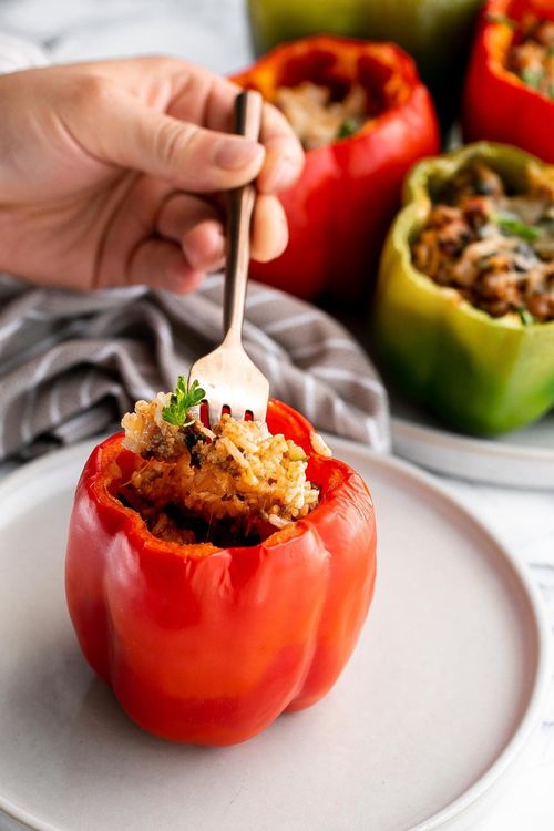 Step 5.1: Bake the stuffed peppers in a preheated oven at 375°F for 40-45 minutes until the peppers soften and the cheese turns golden brown