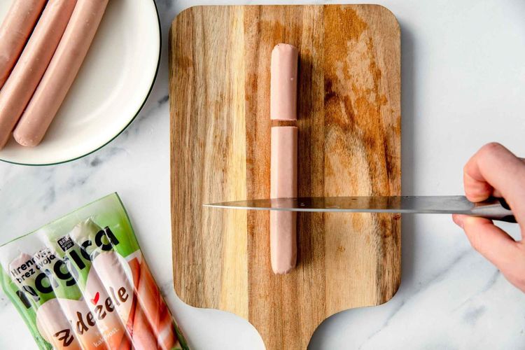 Step 3.1: Cut four hot dogs into three parts to get 12 mini hot dogs