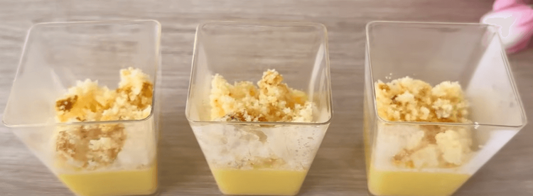 Step 1.1: Pour the mango mixture over the crumbled cake