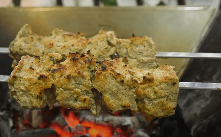Step 1.2: Place the skewers on a BBQ grill over burning charcoal and grill from all sides until done, basting with oil