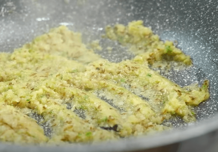 Step 2.1: Add ginger garlic, green chilli paste, and mix well