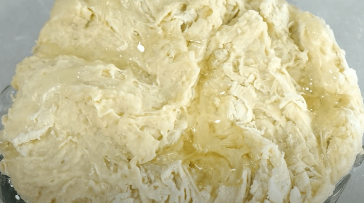 Step 1.1: Add cooking oil, mix well, and knead until dough is formed
