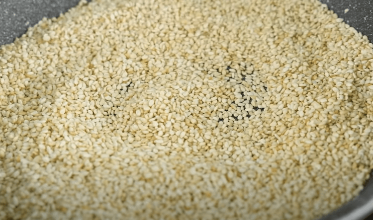 Step 1.1: In a frying pan, add sesame seeds and dry roast on low flame for 2-3 minutes or until golden