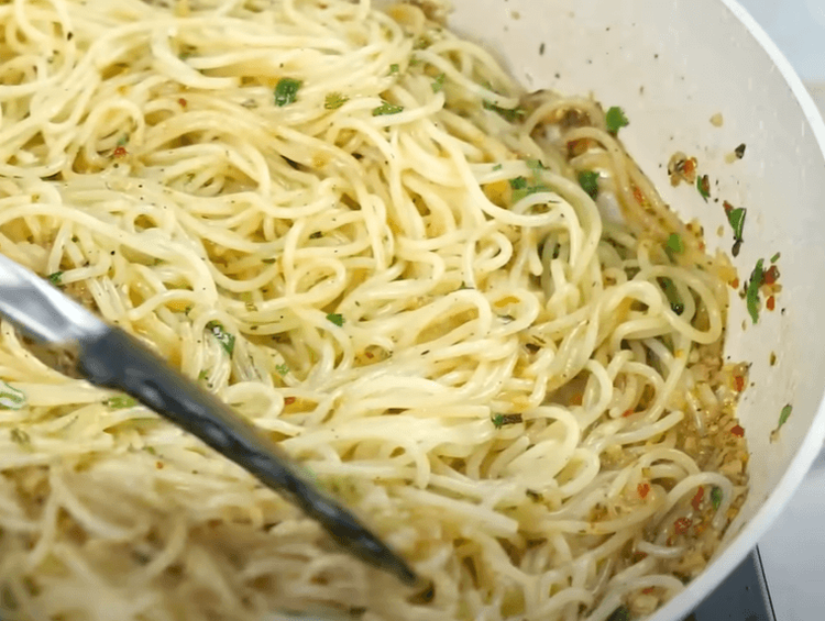 Step 2.2: Add boiled spaghetti, fresh coriander, and toss well